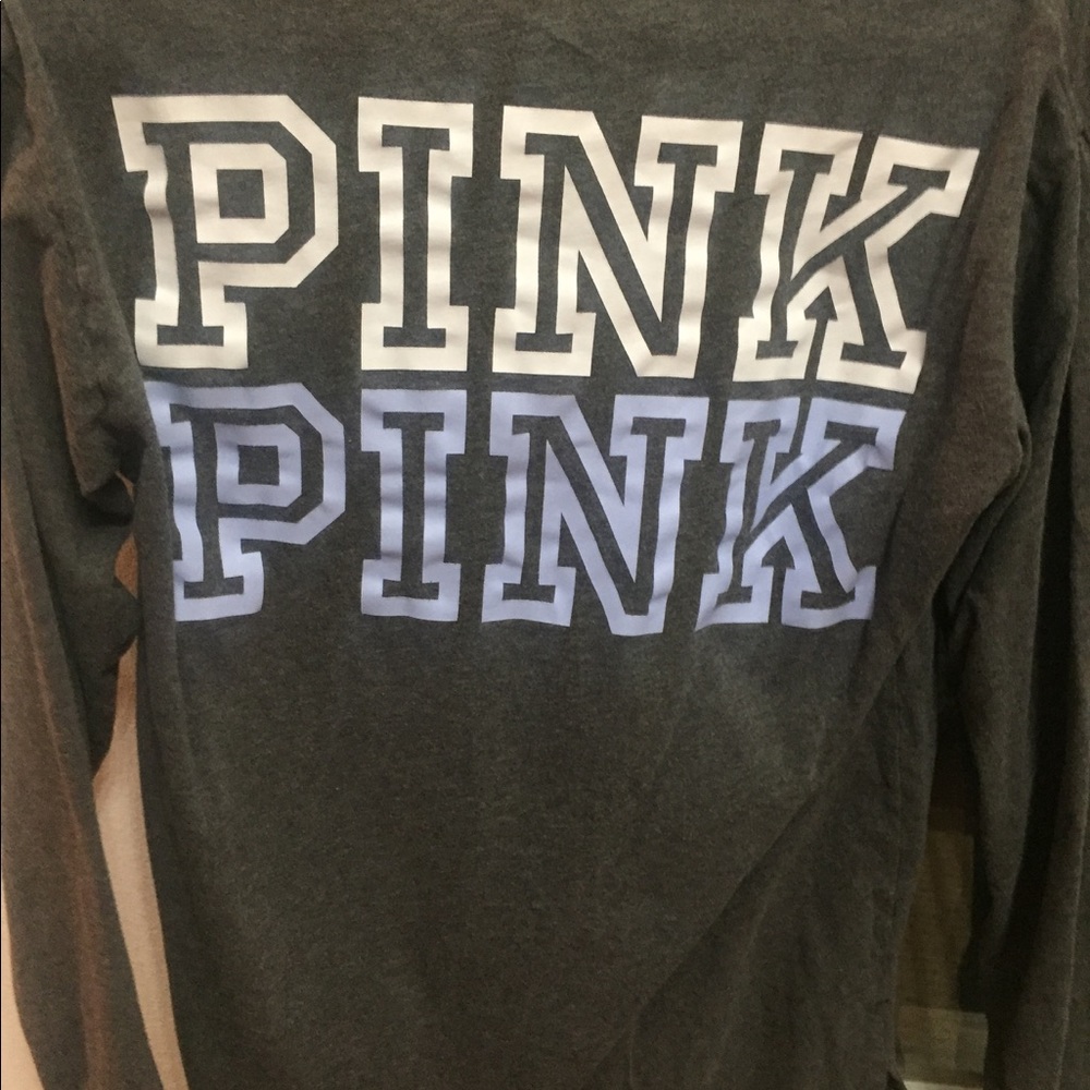 Pink long sleeve pocket tee.